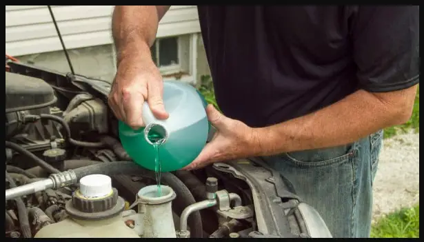 What happens if you accidentally put oil in the coolant reservoir?