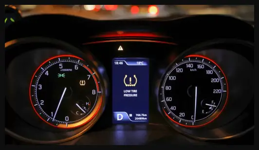 Can low tire pressure cause traction control light to come on?